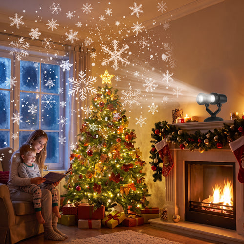 Dual-head snowflake projector on a fireplace mantel projecting snowflakes across a Christmas living room while a mother reads to her son